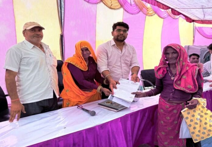 Elderly woman gets relief in the camp