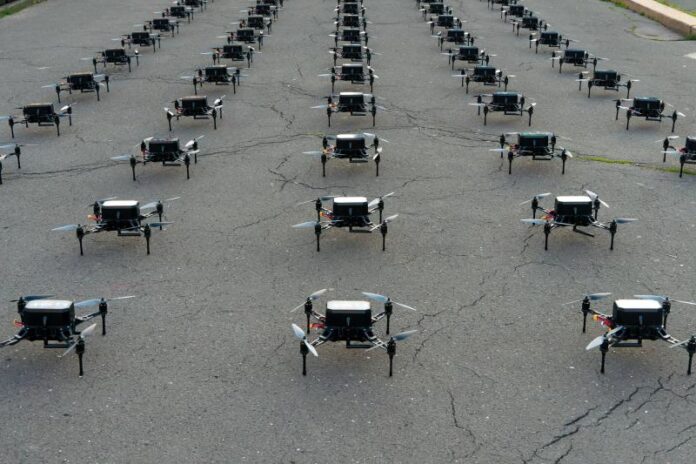 row-of-drones-arranged-symmetrically-on-the-ground-2026-01-09-08-39-58-utc.jpg